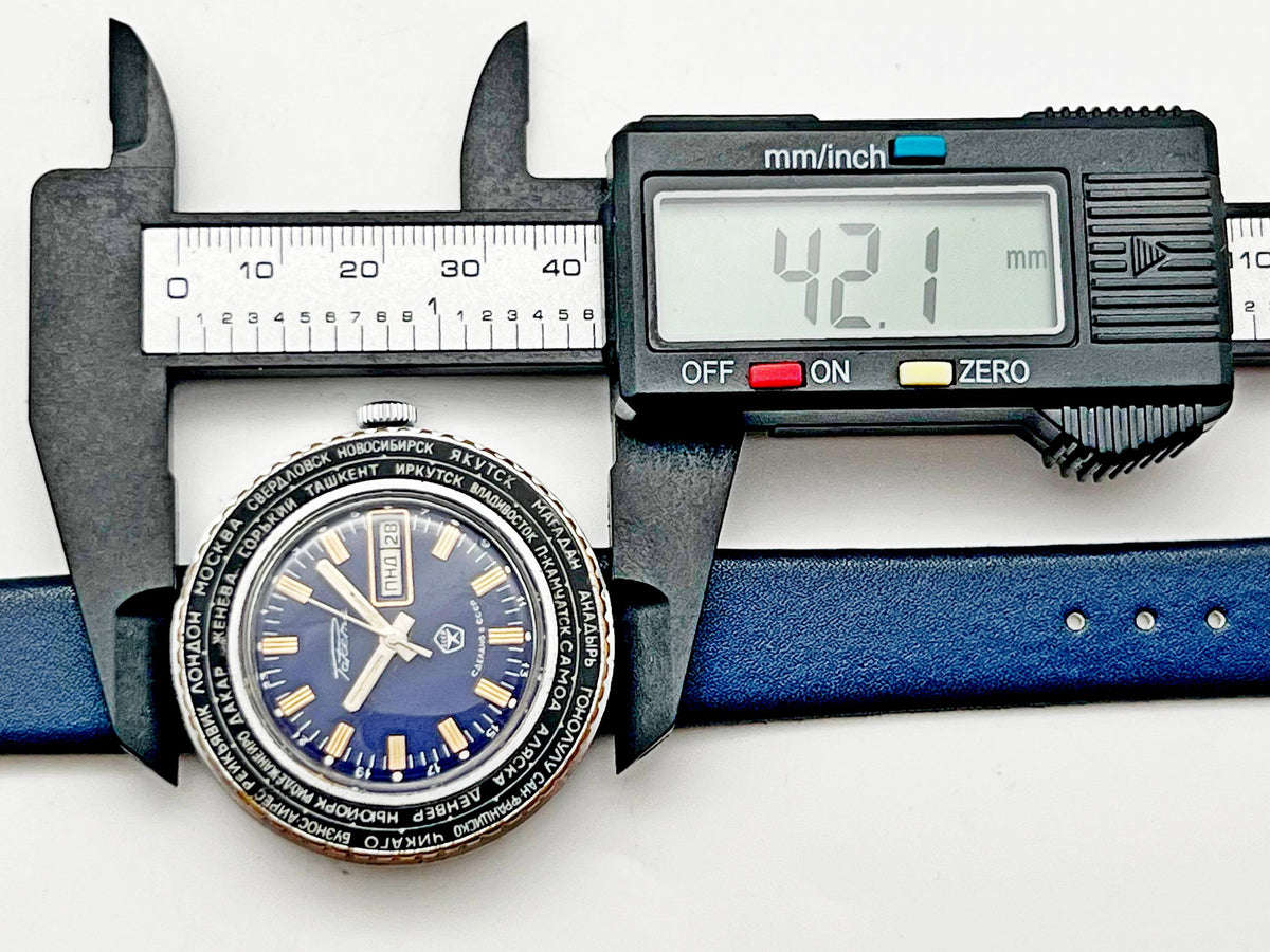 Vintage RAKETA World Time Soviet Mechanical Watch Blue Dial | USSR Cities Day/Date Men's Dress Watch